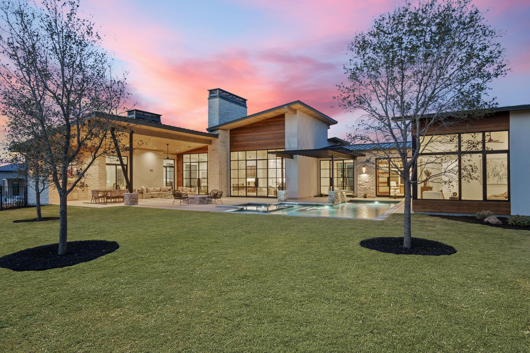 Rear exterior, pool, and outdoor living at 1047 Overlook Parkway in The Trails of Horseshoe Bay