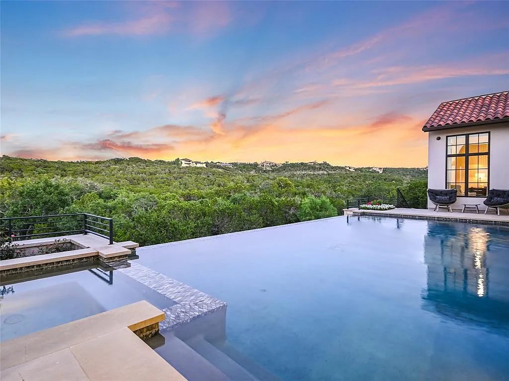 Infinity pool and Hill Country view at sunset